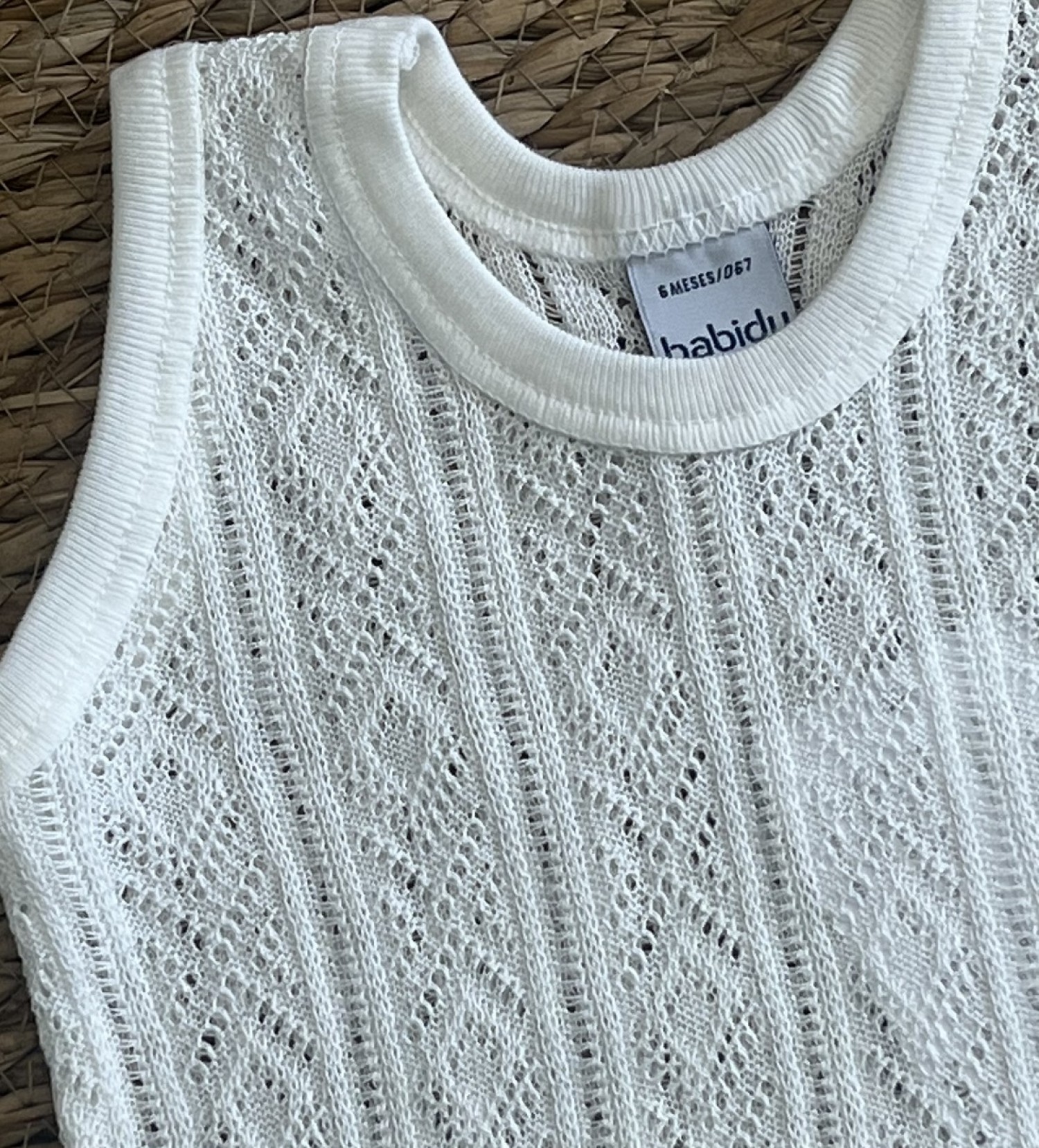 Beige or white perle bodysuit for boy